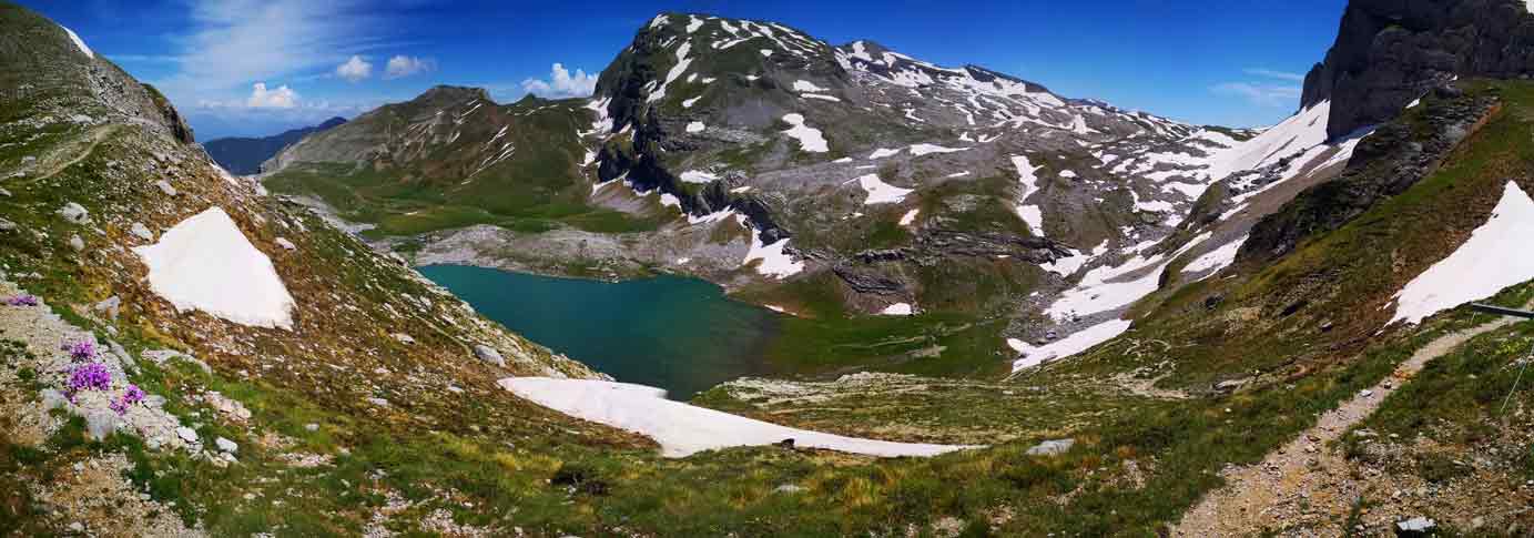 curly nomad europe greece epirus papigo alpine lake hiking mountain meadows drakolimni where the dragons live photo