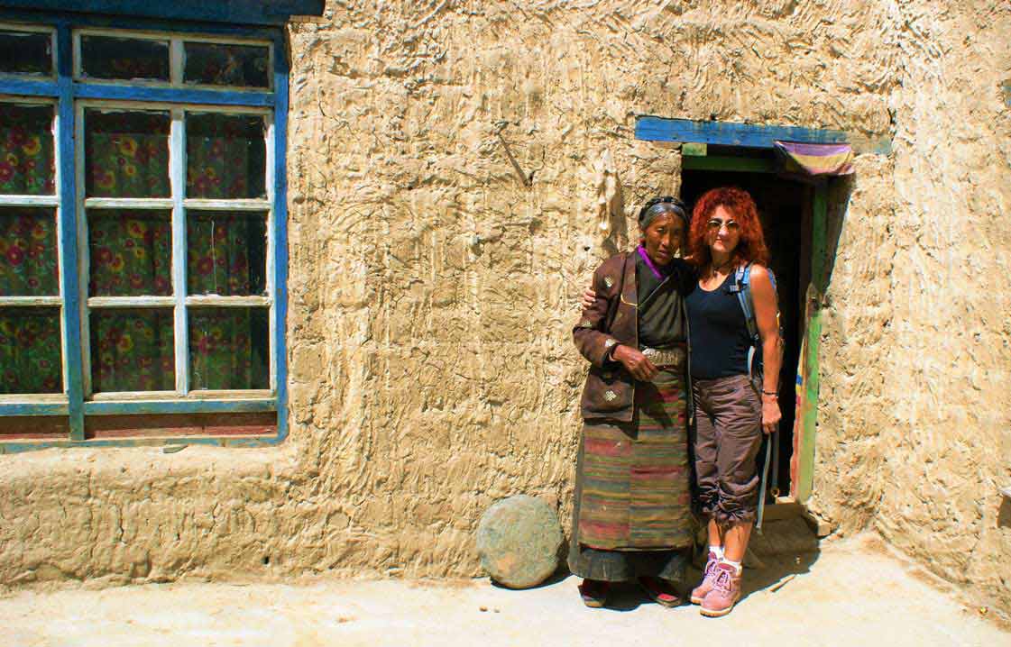curly nomad asia tibet himalaya mountains monasteries women photo